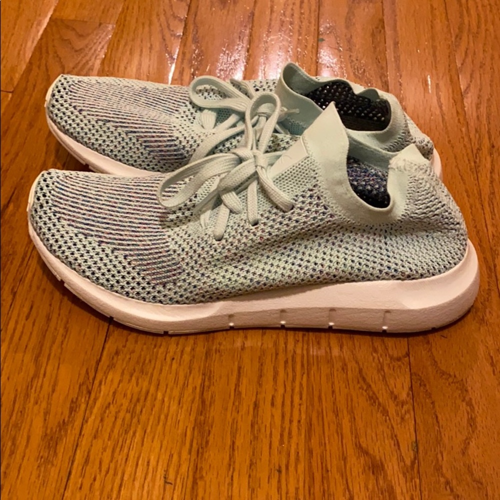 Mint green and rainbow Adidas shoes